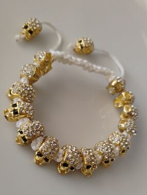 Gold tone Crystal Skull Beaded Macramé Bracelet - White Cord